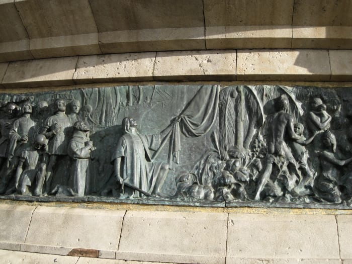 Bronze Sculpture of Columbus landing in the New World. Sculpture at base of Columbus Monument in Barcelona, Spain.