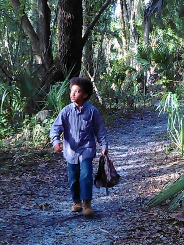 Nicholas taking a stroll through one of the hiking trails at a local historic site called Sam's House. He is such a hands-on learner.