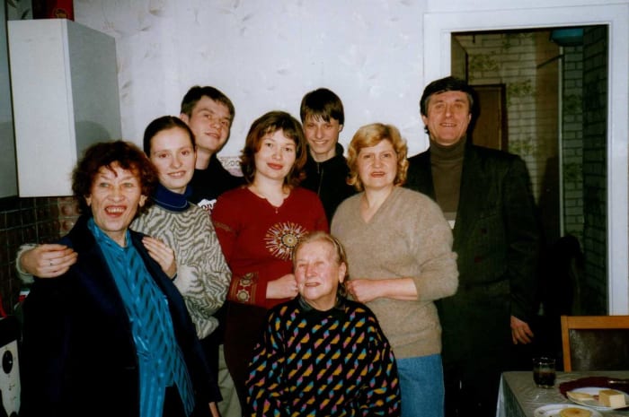 From left, Lina, Stepan's daughter Masha, oldest son Fedor and his wife Elena, youngest son Dima, Stepan's wife Lida, and Stepan himself. Front seated, Lina's sister Nina Fedorovna.