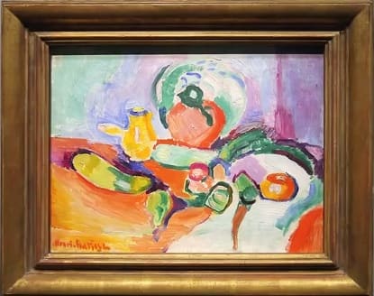 A Still Life by Henri Matisse. Notice the dynamism represented in otherwise still objects and the unrealistic use of color.