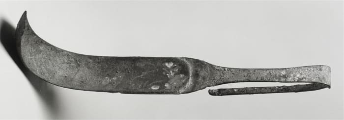 A strigil used to scrape dirt from oiled skin