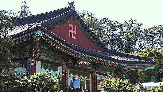A left pointing swastika which can be seen on a temple in South Korea - this swastika symbol is revered by hundreds of millions of Buddhists throughout the world