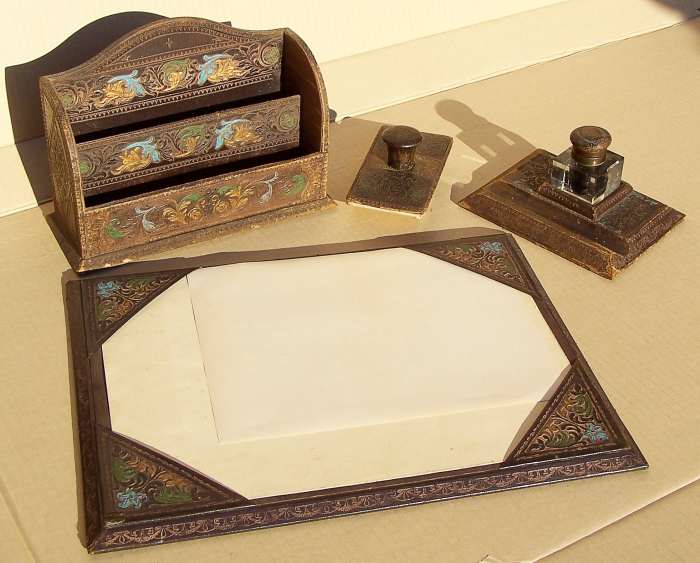 This blotting paper (the larger yellow sheet) dates from the early twentieth century. The Clock family used blotting paper as a carpet.