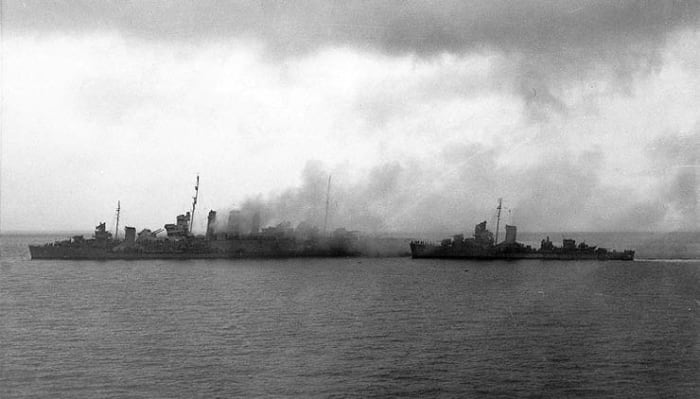 American destroyers rescuing the surviving crew from the Australian flagship Canberra after the Battle of Savo Island. The Canberra suffered 24 hits from Japanese warships it would sink soon after this picture was taken.