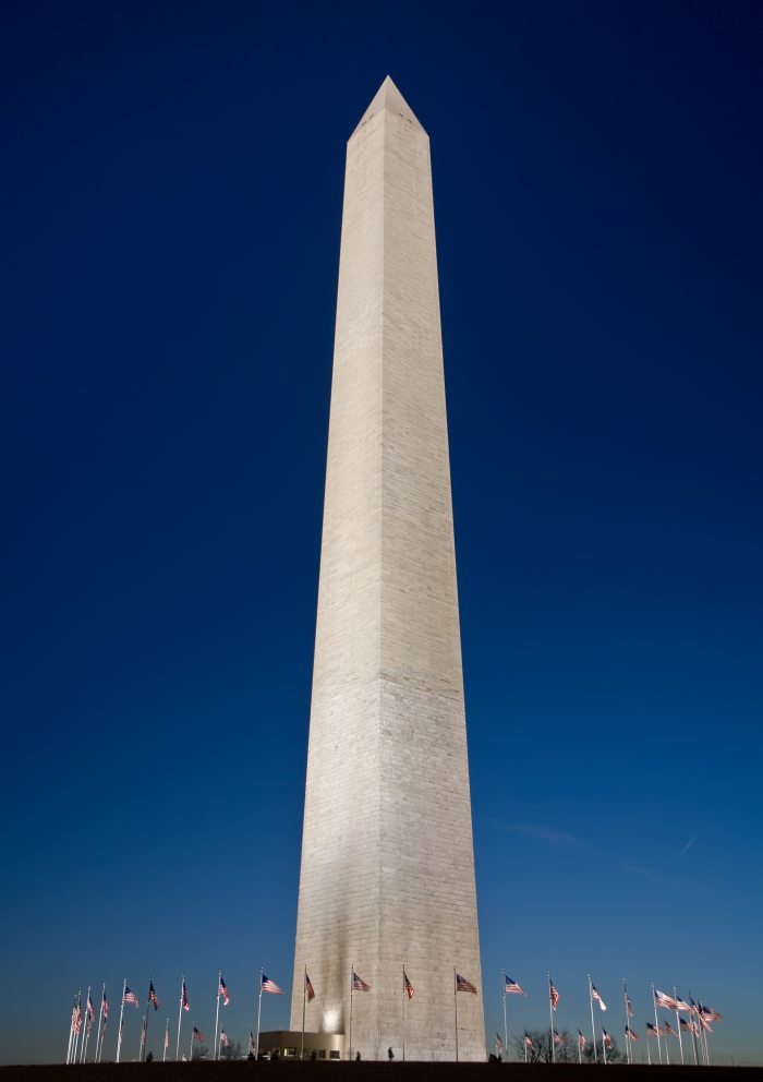 The Washington Monument. The monument is made of marble, granite, and bluestone gneiss and is the world's tallest obelisk, standing 554 feet 7 and 11/32 inches high. Construction of the monument began in 1848 and was finally completed in 1888.