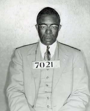 Photo of American civil rights leader and union organizer, Edgar Daniel Nixon, after he was arrested during the Montgomery bus boycott. Parks worked as his secretary through most of the 1940s and 50s.