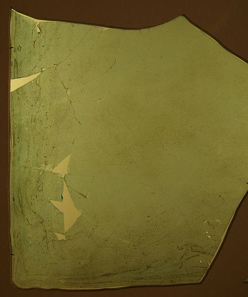An piece of ancient Roman window glass from the 4th century and now housed in the Gäubodenmuseum in Germany.