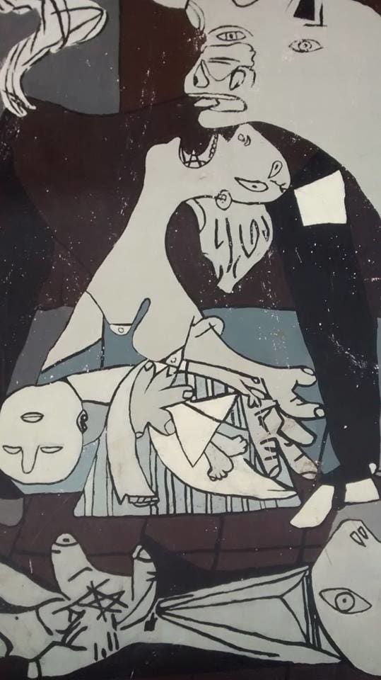 There were numerous depictions of people grieving, like with this woman who is screaming while holding her dead baby.