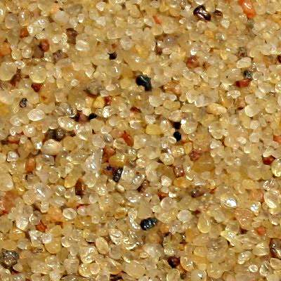 'Typical' quartz sand. Note the predominant colour of the sand, but also note the variety of other minerals in the sample