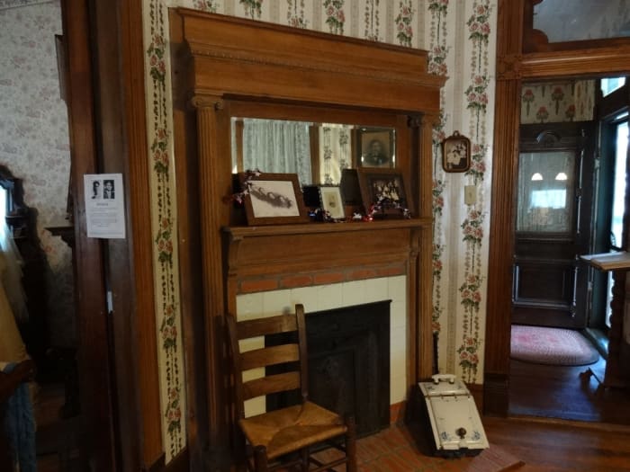 The room to the left of the entry door often used to greet and entertain guests who visited.