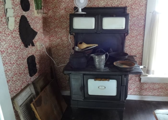 Cooking was done on cast iron stoves that also provided heat during winter months and the heat of summer.