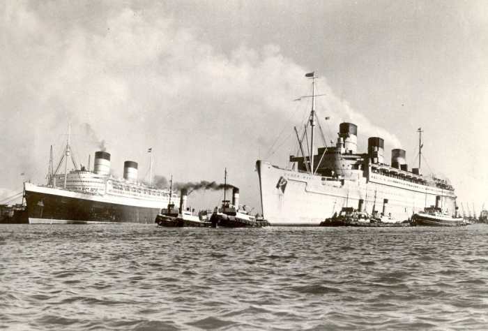 RMS Queen Elizabeth converted back to civilian service alongside RMS Queen Mary still as a troopship.