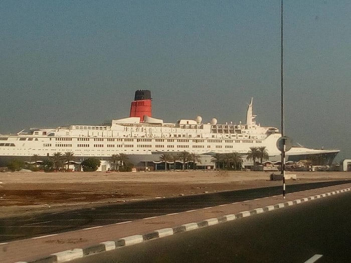 One of the most recent photos of the QE2 taken in August 2016 showing the missing lifeboats and davits.