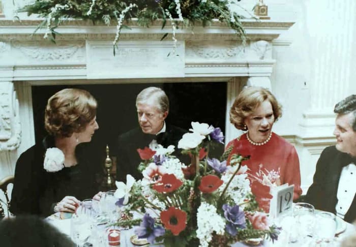 Margaret Thatcher with President Jimmy Carter and first lady Rosalynn Carter during a state dinner at the White House.