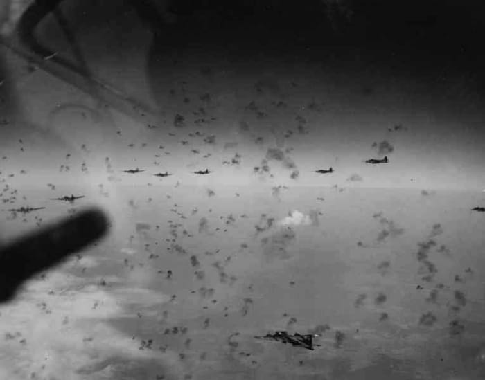B-17s flying through anti-aircraft fire over Schweinfurt the Eight Air Force experienced heavy losses from thick clouds of anti-aircraft fire over Germany.