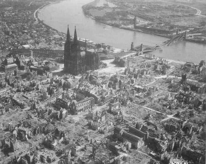Cologne Germany 1945 after Allied bombing. Cologne cathedral rises above the scene of devastation. The city would undergo the first thousand plane raid on May 30/31 1942.