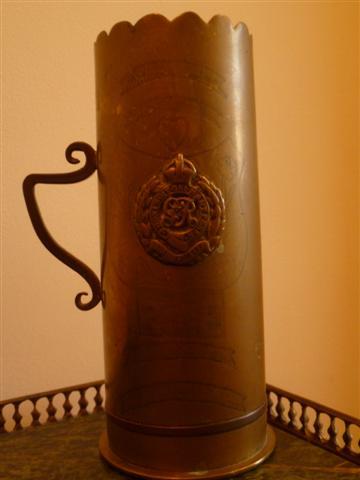 A piece of trench art made from a shell casing. It is inscribed Vimy 1917 and bears the crest of the Royal Engineers.