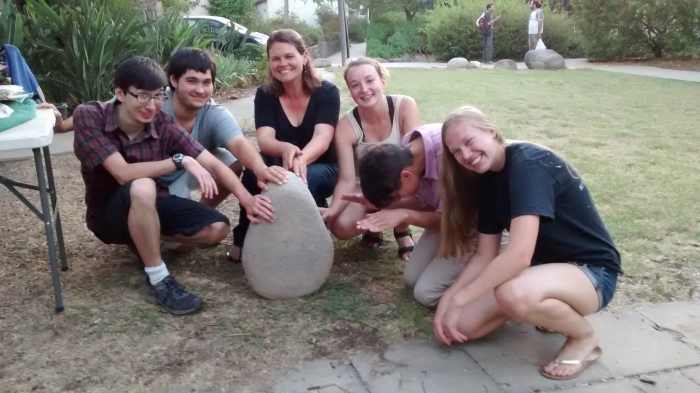 This is a carved piece of basalt that was found in the square I was in. We aren't sure entirely what it's purpose is, but we think it may have to do with religion.
