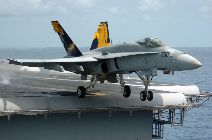 Typical legacy Hornet launching from an aircraft carrier