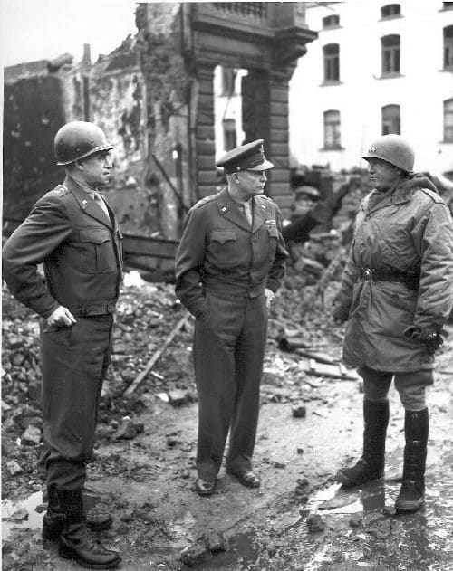 The main three American Generals on the Western Front 1945, General Omar Bradley, General Dwight Eisenhower, and General George Patton. Bradley would be he only General in American history to lead four field armies almost a million men.