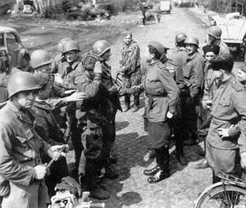 April 25, 1945, The Red Army's 58th Guards Division of the 5th Guards Army meets the U.S. 69th Infantry Division of the First Army near Torgau, on the Elbe River.