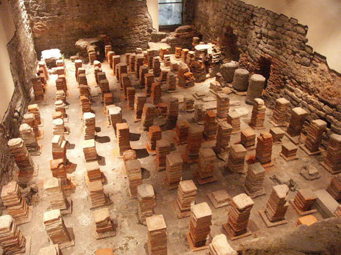 Caldarium from the Roman Baths at Bath, England. The floor has been removed to reveal the empty space where the hot air flowed through to heat the floor.