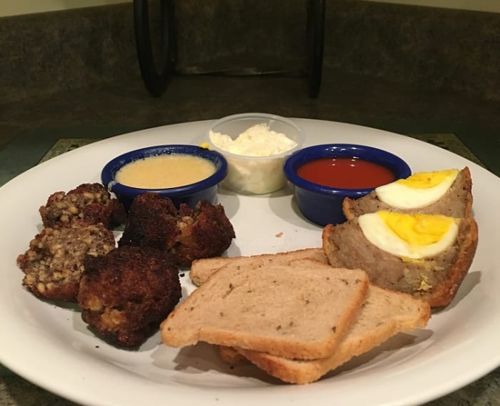 Robbie Burns Day Dinner 2018 -- fried haggis balls, Scotch eggs, and whole grain bread.