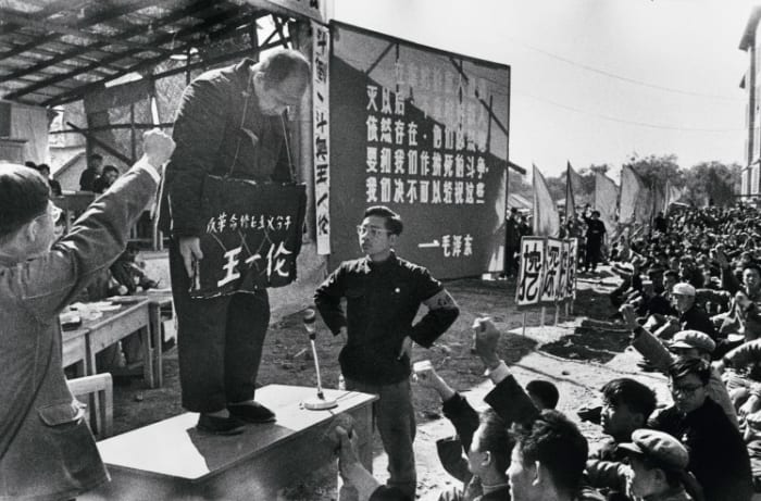 A struggle session where people were encouraged to "struggle" against counter-revolutionary elements to make them admit to their crimes : psychologically damaging and humiliating at best, and conducive to physical violence at worst.