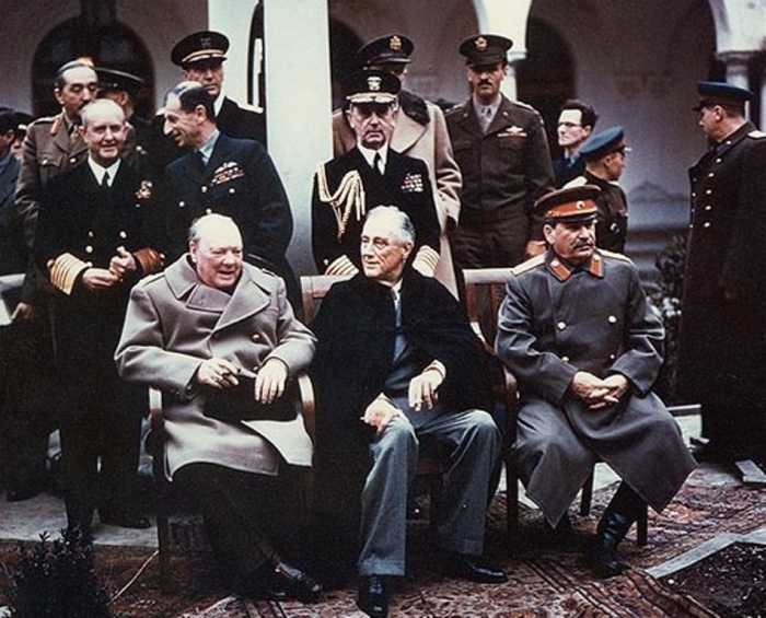 Attendees at the Yalta Conference. From left to right in the foreground: Winston Churchill, Franklin D. Roosevelt and Joseph Stalin.