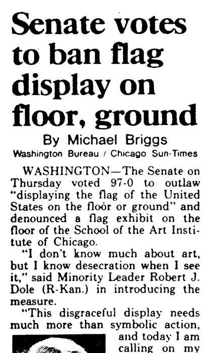 Another newspaper article about the court case surrounding Dread Scott's controversial work of art.