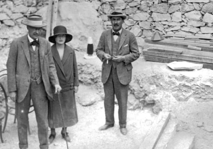 Howard Carter, Lord Carnarvon and his daughter Lady Evelyn Herbert at the steps leading to the newly discovered tomb of Tutankhamen, November 1922.