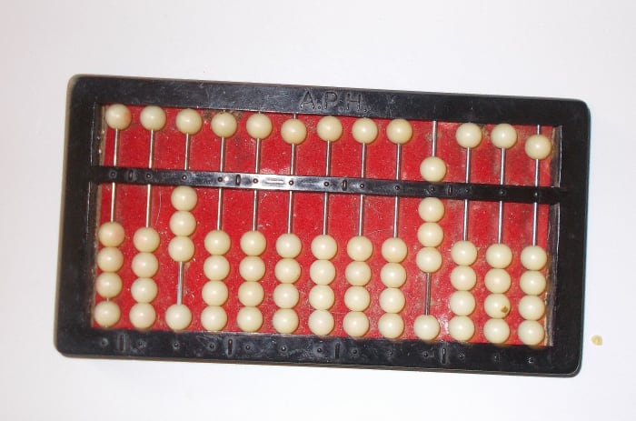 This is the fraction which is the answer for the equation ½ x ¾. The abacus is showing 3/8.