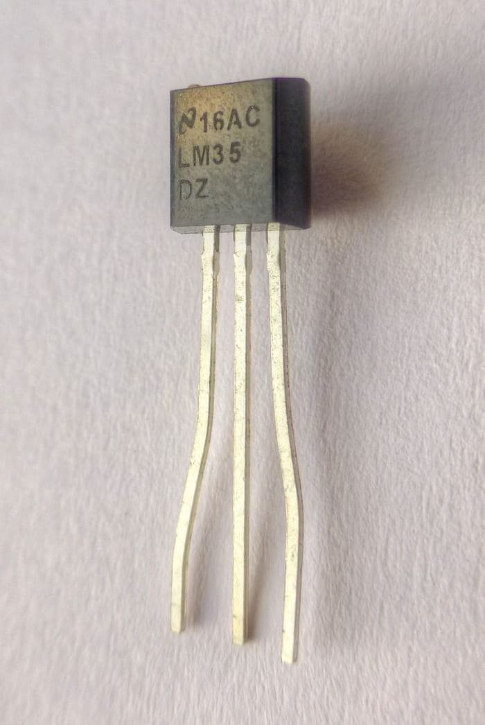 Integrated circuit (IC) temperature sensor. This is an electronic component that can measure temperature and produce an electrical signal proportional to it.