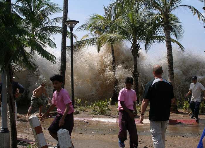 This shot captures the very destructive 2004 tsunami as it comes ashore in Thailand. A megatsunami would likely have a higher wall of water.