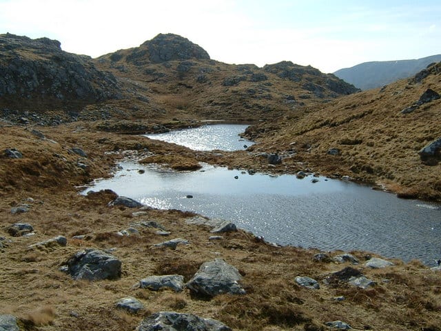 The rock underlying this landscape in Northwest Scotland is gneiss, a type of metamorphic rock