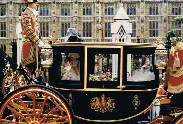Sarah Ferguson arriving by a horse drawn royal carriage to her wedding.