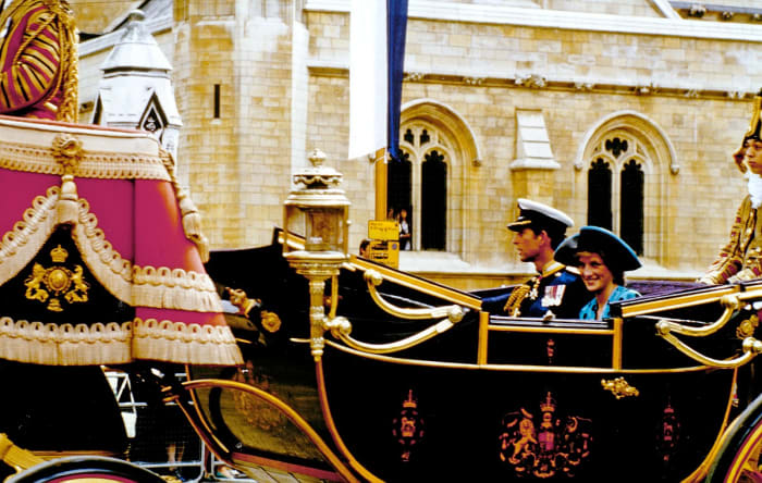 Prince Charles and Princess Diana arrive by carriage to Prince Andrews wedding