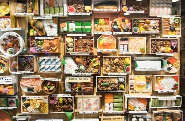 Salarymen buy these boxed lunches prior to their subway ride to the office. Many of them do not go out to lunch and eat at their desks.