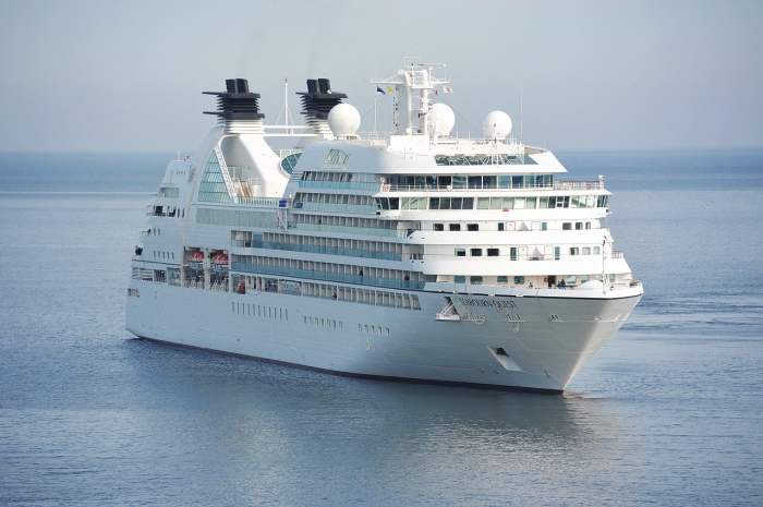 Ships float because they displace a huge amount of water and the buoyant force can support the weight of the ship.