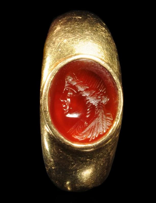 This Grecian portrait ring is set with a carved carnelian stone, which depicts a woman who was likely a Ptolemaic queen, according to experts.