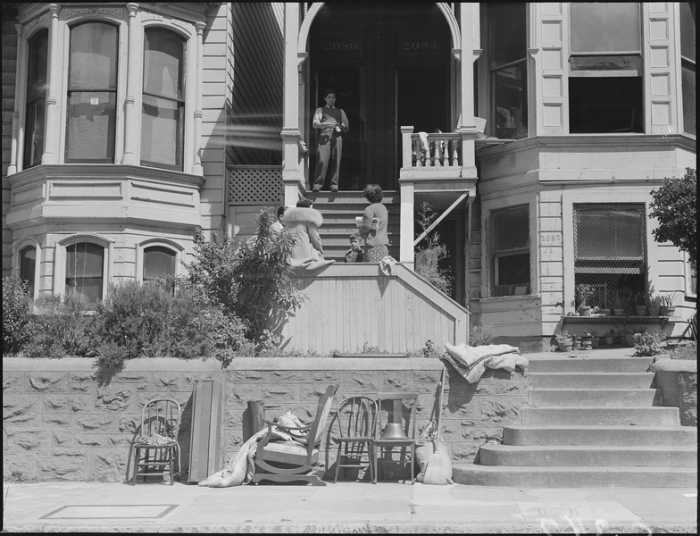 WWII: A Japanese family awaits "evacuation" to a "relocation center" in San Francisco. April 29, 1942.