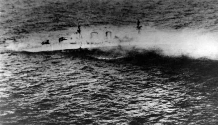 The last moments of a legendary ship: HMS Exeter sinks after scuttling.