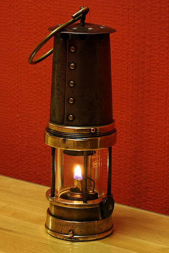 A Davy Lamp, invented by Sir Humphrey Davy who was president of the Royal Institution and became Michael Faraday's mentor.