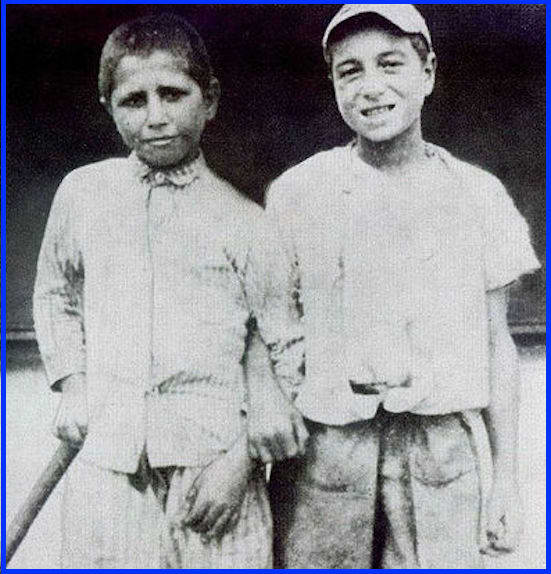 Here's Babe Ruth (on the right) at age seven, shortly after entering St. Mary's Industrial School for Boys.