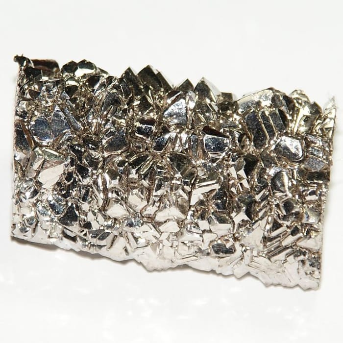 Titanium is a grey, light, but very strong metal.