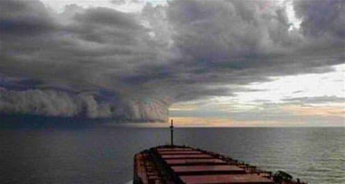 Seen from the bow of a Caribbean ship, Hurricane Harvey ominously makes its way toward the Texas coast.