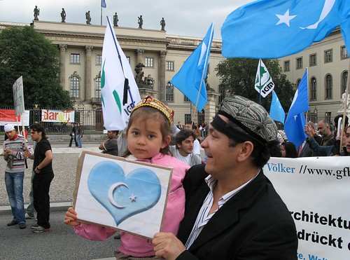 A mild Uighur protest in Berlin that would land this man behind bars for a long time in China.