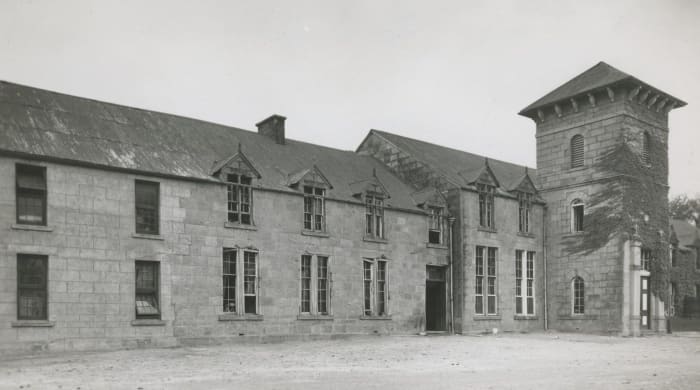The main building in about 1948 showing the Boys' Boarding Department. The bell tower added in 1899 in memory of Matthew Blyth is to the right of the photo. The tower also held the bell donated by Nogaga.