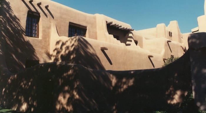 Whether historic or not, all buildings in Santa Fe, New Mexico are built according to the adobe-hacienda code.