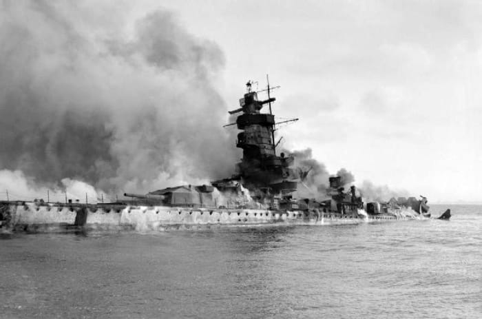 Admiral Graf Spee scuttled and in flames in the River Plate Estuary off Montevideo, Uruguay after being tricked into thinking a large British force awaited her in international waters. December 17, 1939.